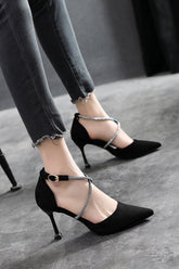 Black temperament hollow stiletto pointed toe high heels