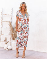 Hollow Floral Pocketed Tie Jumpsuit