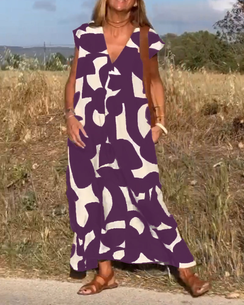 Roni - Dress with print and V-neckline