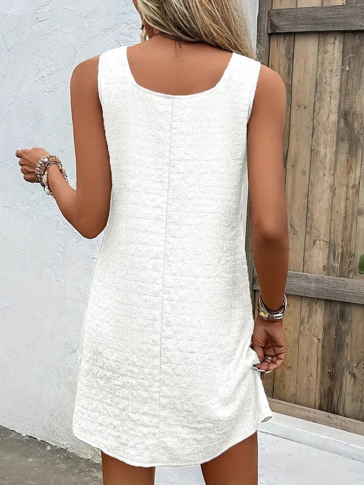 SLEEVELESS DRESS WITH ASYMMETRICAL COLLAR