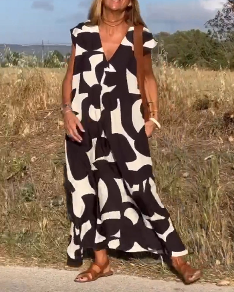 Roni - Dress with print and V-neckline